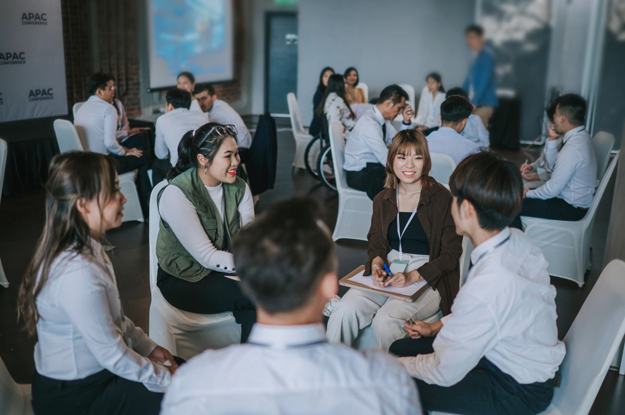 IT training workshop with professionals collaborating