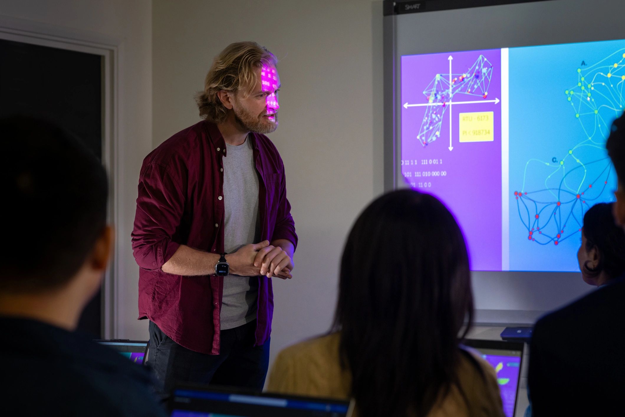 Instructor presenting technical material during a seminar