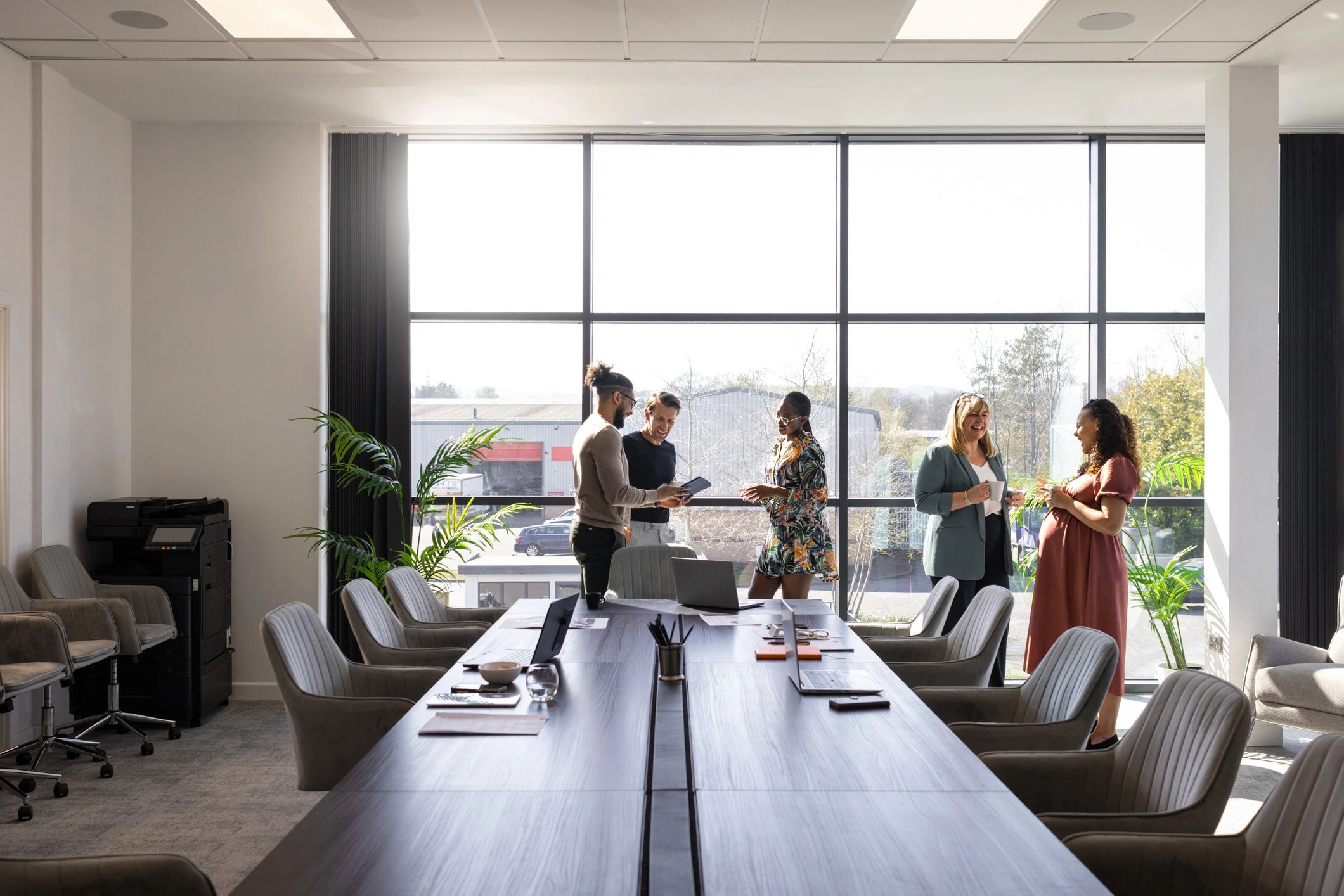 Technology professionals meeting in a modern conference room